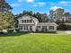 Charming single Gathering home with a large front yard at 3188 Village Glen Dr, Snellville, GA 30039