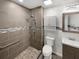 Updated bathroom with walk-in shower, new vanity, and modern fixtures at 3188 Village Glen Dr, Snellville, GA 30039