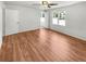 Bright bedroom featuring hardwood floors and ample natural light at 3188 Village Glen Dr, Snellville, GA 30039