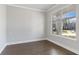 Bright home office features hardwood floors and large window with neighborhood view at 6067 Ruby Falls, Stonecrest, GA 30038