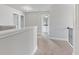 Upstairs hallway with access to bedrooms and bathroom at 6067 Ruby Falls, Stonecrest, GA 30038