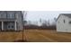 Homes with grassy backyard and partially wooded area at 6093 Ruby Falls Way, Stonecrest, GA 30038