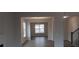 Bright dining room with hardwood floors and large windows at 6093 Ruby Falls Way, Stonecrest, GA 30038