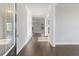 Inviting entryway with hardwood floors opening to living room at 6103 Ruby Falls, Stonecrest, GA 30038