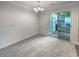 Dining area with sliding glass door to patio at 6531 Arbor Gate Sw Dr # 12, Mableton, GA 30126