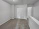 Upstairs bedroom with double door closet and neutral decor at 6531 Arbor Gate Sw Dr # 12, Mableton, GA 30126