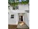 Rear exterior view showing patio and sliding glass door at 6531 Arbor Gate Sw Dr # 12, Mableton, GA 30126