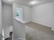 Spacious loft area with neutral carpeting and an open feel at 6531 Arbor Gate Sw Dr # 12, Mableton, GA 30126