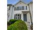 Two story home with gray door and landscaping at 6531 Arbor Gate Sw Dr # 12, Mableton, GA 30126