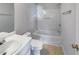 Clean bathroom with a bathtub, toilet and sink at 6531 Arbor Gate Sw Dr # 12, Mableton, GA 30126