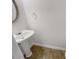 Small powder room with pedestal sink at 6531 Arbor Gate Sw Dr # 12, Mableton, GA 30126
