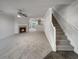 Living room with fireplace and stairs to the second floor at 6531 Arbor Gate Sw Dr # 12, Mableton, GA 30126