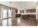 Kitchen with island, breakfast area, and access to deck at 6175 Grindle Rd, Cumming, GA 30041