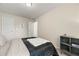 Comfortable bedroom with queen bed and closet at 7041 Livia Pt, Riverdale, GA 30296