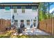 Private backyard with patio, fire pit, and grill at 7041 Livia Pt, Riverdale, GA 30296
