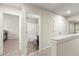 Upstairs hallway with access to bedrooms and bathroom at 7041 Livia Pt, Riverdale, GA 30296
