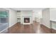 Living room with hardwood floors, fireplace, and patio access at 707 Cumberland Se Ct, Smyrna, GA 30080