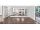 Living room with hardwood floors, fireplace and mirrored wall at 707 Cumberland Se Ct, Smyrna, GA 30080