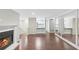 Open living room with hardwood floors and fireplace at 707 Cumberland Se Ct, Smyrna, GA 30080