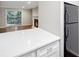 Kitchen with white cabinets and quartz countertops at 707 Cumberland Se Ct, Smyrna, GA 30080
