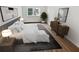 Spacious bedroom with hardwood floors, large windows, and ample natural light at 6520 Roswell Rd # 68, Atlanta, GA 30328