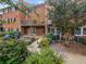 Brick patio with access to the unit and surrounded by beautiful landscaping at 6520 Roswell Rd # 68, Atlanta, GA 30328
