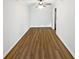 Bright dining room with wood-look floors and ceiling fan at 6520 Roswell Rd # 68, Atlanta, GA 30328