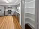 Modern kitchen with gray cabinets, granite counters, and stainless steel appliances at 6520 Roswell Rd # 68, Atlanta, GA 30328