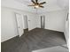 Spacious primary bedroom with carpet and ceiling fan at 120 Blackberry Run, Fayetteville, GA 30214