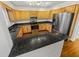Kitchen with light wood cabinets, granite countertops and stainless steel appliances at 120 Blackberry Run, Fayetteville, GA 30214