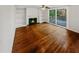 Spacious living room featuring hardwood floors and a fireplace at 120 Blackberry Run, Fayetteville, GA 30214