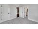 Bedroom with access to bathroom and additional room at 1356 Flora Dr, Conyers, GA 30094