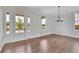 Bright dining room with hardwood floors and chandelier at 1356 Flora Dr, Conyers, GA 30094