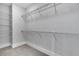 Large walk-in closet with wire shelving providing ample storage at 1356 Flora Dr, Conyers, GA 30094