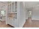 White built-in cabinets with glass doors and granite top at 1356 Flora Dr, Conyers, GA 30094