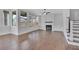 Spacious living area with hardwood floors, fireplace, and access to backyard at 1356 Flora Dr, Conyers, GA 30094