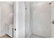 Bathroom with a large walk-in shower and gray tile at 1356 Flora Dr, Conyers, GA 30094