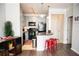 Modern kitchen with dark cabinetry, stainless steel appliances, and a breakfast bar at 401 16Th Nw St # 1157, Atlanta, GA 30363