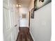 Bright hallway with wood-look floors and access to closets and other rooms at 401 16Th Nw St # 1157, Atlanta, GA 30363