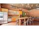 Community kitchen with island and seating at 401 16Th Nw St # 1157, Atlanta, GA 30363