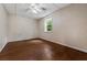Spacious basement bedroom with wood flooring and large window at 2690 Hideaway Hills Sw Ln, Powder Springs, GA 30127