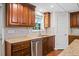 Basement kitchen with granite countertops and stainless steel appliances at 2690 Hideaway Hills Sw Ln, Powder Springs, GA 30127