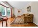 Living room with hardwood floors, bay window and fireplace at 2690 Hideaway Hills Sw Ln, Powder Springs, GA 30127