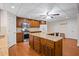 Open concept basement kitchen with island and stainless steel appliances at 2690 Hideaway Hills Sw Ln, Powder Springs, GA 30127