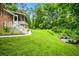 House with large backyard, deck and screened porch at 2690 Hideaway Hills Sw Ln, Powder Springs, GA 30127