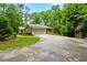 Attached garage with long driveway at 2690 Hideaway Hills Sw Ln, Powder Springs, GA 30127