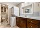 Basement bathroom with updated vanity and stackable washer/dryer at 2690 Hideaway Hills Sw Ln, Powder Springs, GA 30127