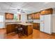 Modern basement kitchen with granite countertops and wood cabinets at 2690 Hideaway Hills Sw Ln, Powder Springs, GA 30127