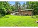 Brick house exterior with a large backyard at 2690 Hideaway Hills Sw Ln, Powder Springs, GA 30127