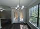 Bright dining area with French doors leading to a patio at 3777 Peachtree Ne Rd # 1622, Atlanta, GA 30319
